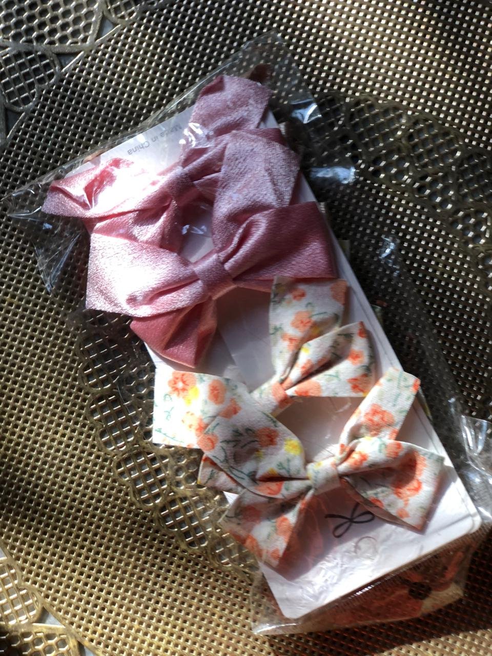 set of pink and floral fabric hair bows